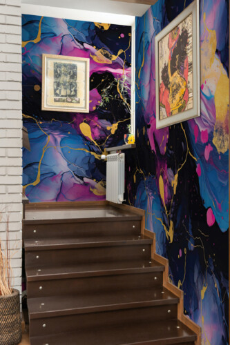 Royal Marble Wall Mural with colorful fluid marble look, bold black contrasts, and golden elements for a luxury living room.