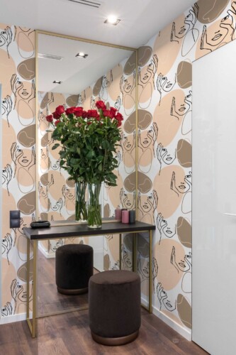 Fancy Walls removable wallpaper with expressive feminine line art and neutral color palette