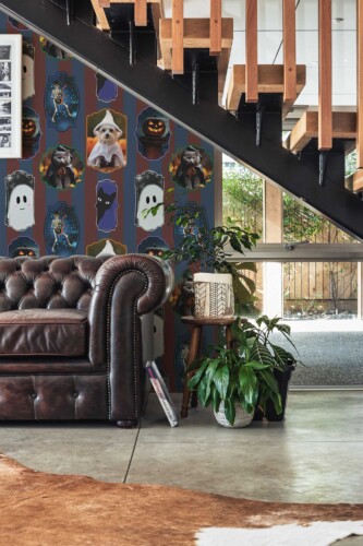 Fancy Walls removable wallpaper with brown framed Halloween skeletons and puppies.