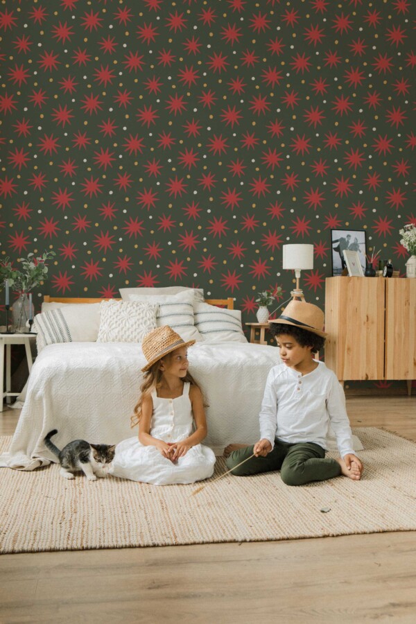 Fancy Walls removable wallpaper with handdrawn Christmas star pattern in green and red.