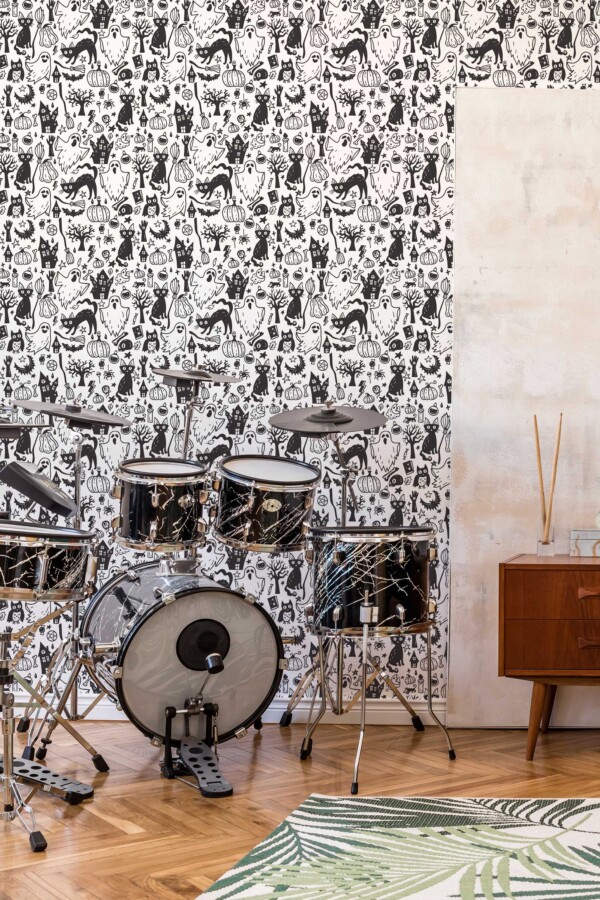 Fancy Walls traditional wallpaper styled with cute Halloween doodles in black and white.