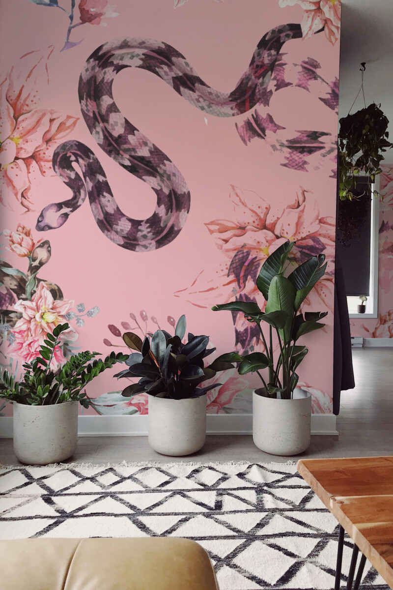 Floral Snakes Wall Mural with watercolor serpents and blooming flowers on a pink background, ideal for eclectic bedrooms.
