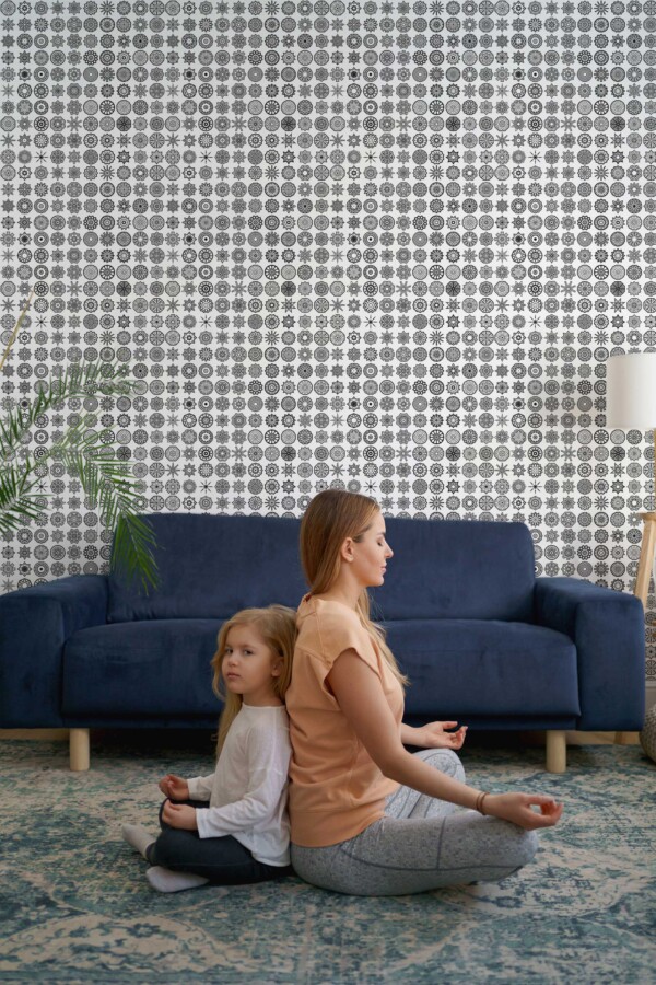 Fancy Walls traditional wallpaper featuring repetitive mandala patterns in black and white