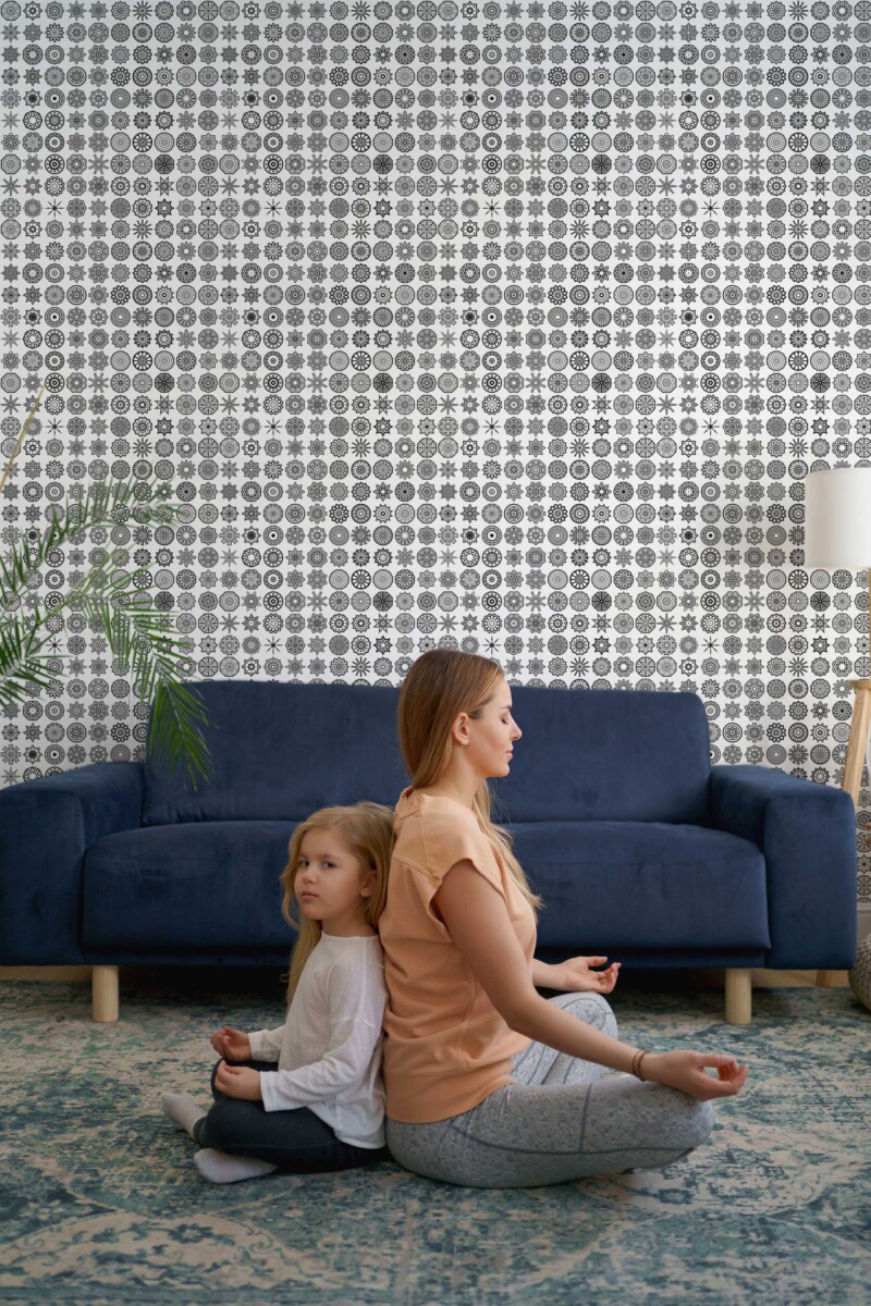 Fancy Walls traditional wallpaper featuring repetitive mandala patterns in black and white