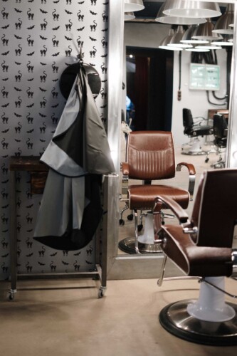 Fancy Walls removable wallpaper with seamless black and white cats and bats design.