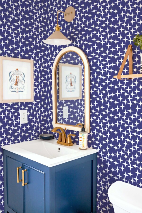 Fancy Walls peel and stick wallpaper with irregular navy stars pattern.