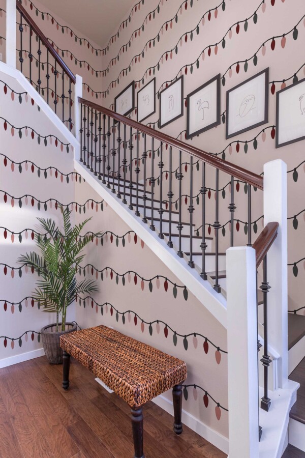 Self-adhesive wallpaper from Fancy Walls featuring festive pastel string lights