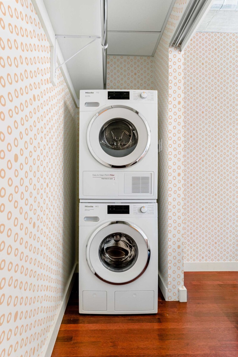 Traditional wallpaper in peach and white dotted pattern by Fancy Walls