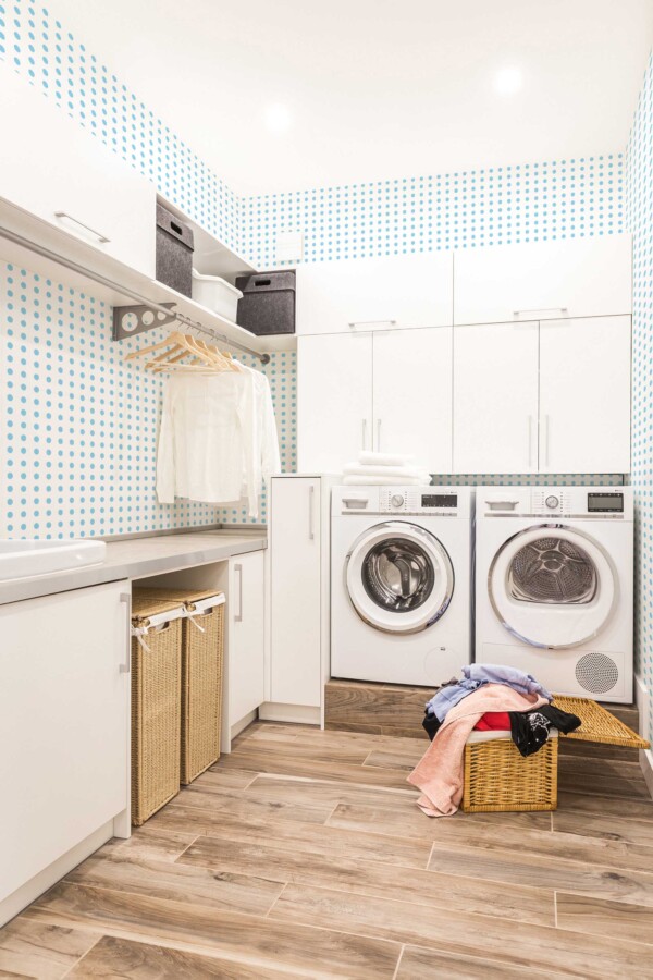 Self-adhesive wallpaper by Fancy Walls featuring cheerful blue and white dotted pattern