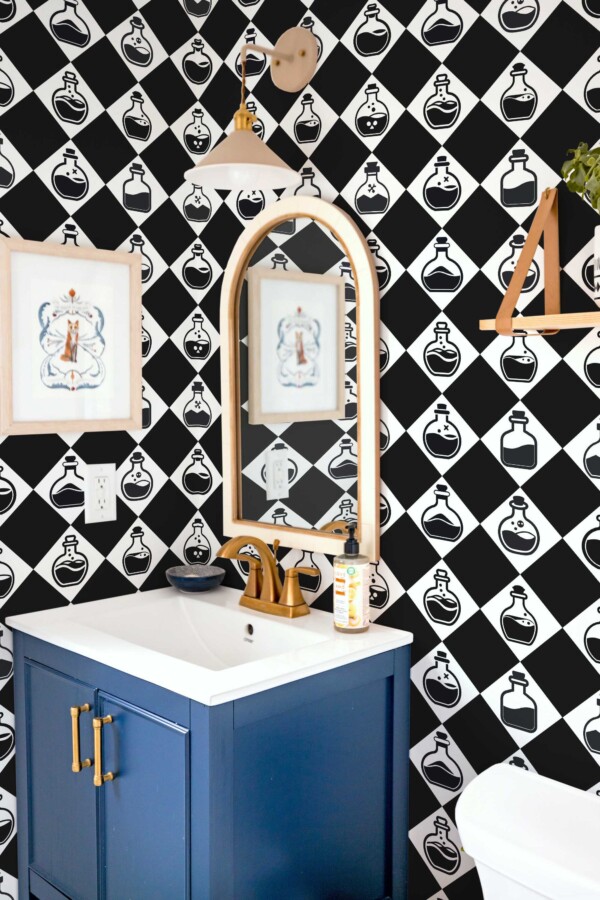 Fancy Walls peel and stick wallpaper with black and white potion bottles on harlequin pattern.