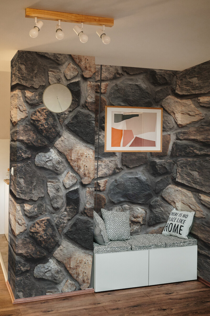 Realistic Stones wall mural in gray and brown tones, ideal for rustic or contemporary accent wall settings.