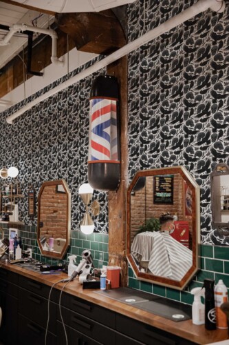 Fancy Walls removable wallpaper with scary skulls and crows design in black and white.