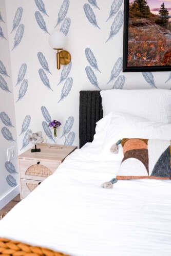 Fancy Walls self-adhesive wallpaper featuring delicate dawn feathers