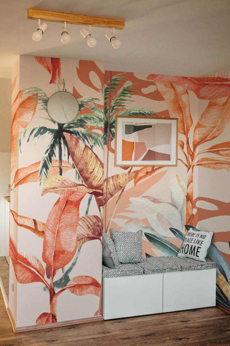 Fancy Walls Tropical Terracotta peel and stick wall mural with bold plants and terracotta leaves for living room interiors.
