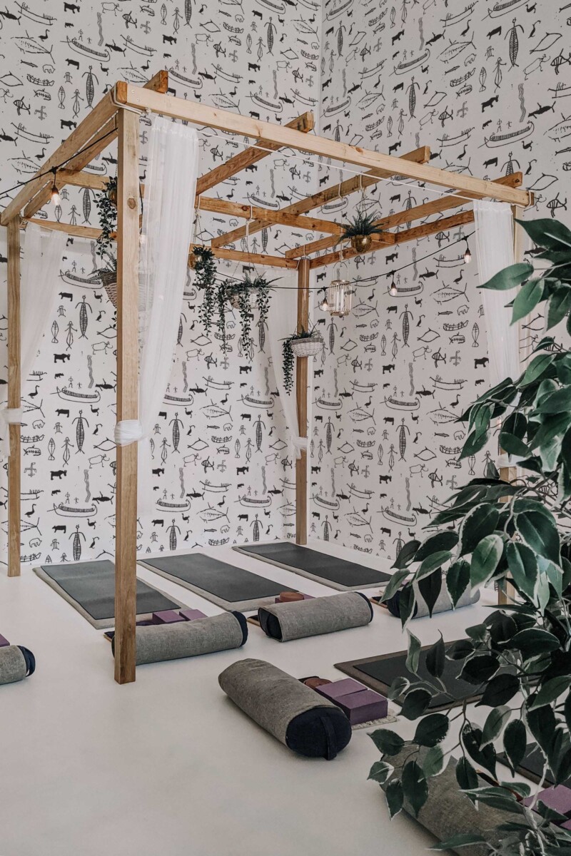 Black and white peel and stick wallpaper with ancient cave illustrations by Fancy Walls