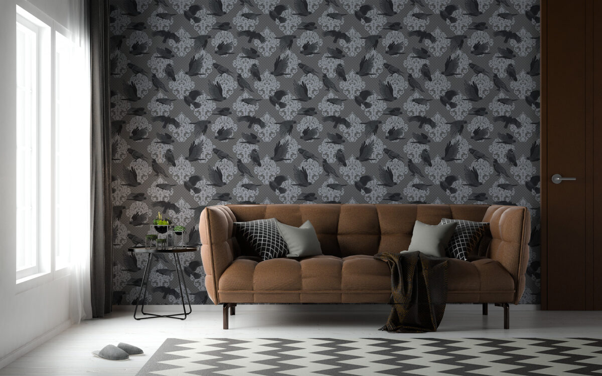 Raven noir peel and stick wallpaper with flying black birds and damask pattern in a moody charcoal-toned bedroom