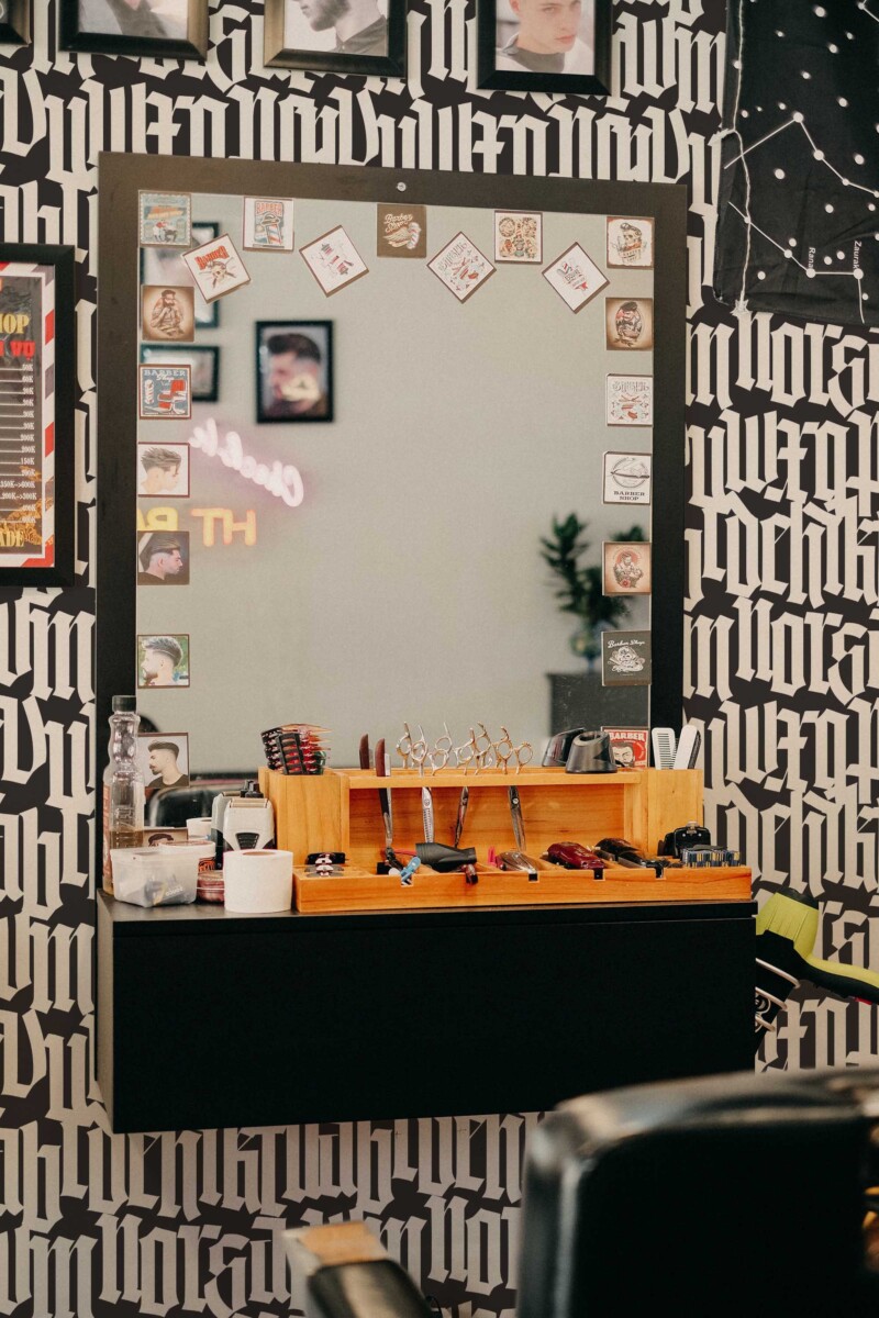 Fancy Walls peel and stick wallpaper featuring black and white gothic lettering pattern.