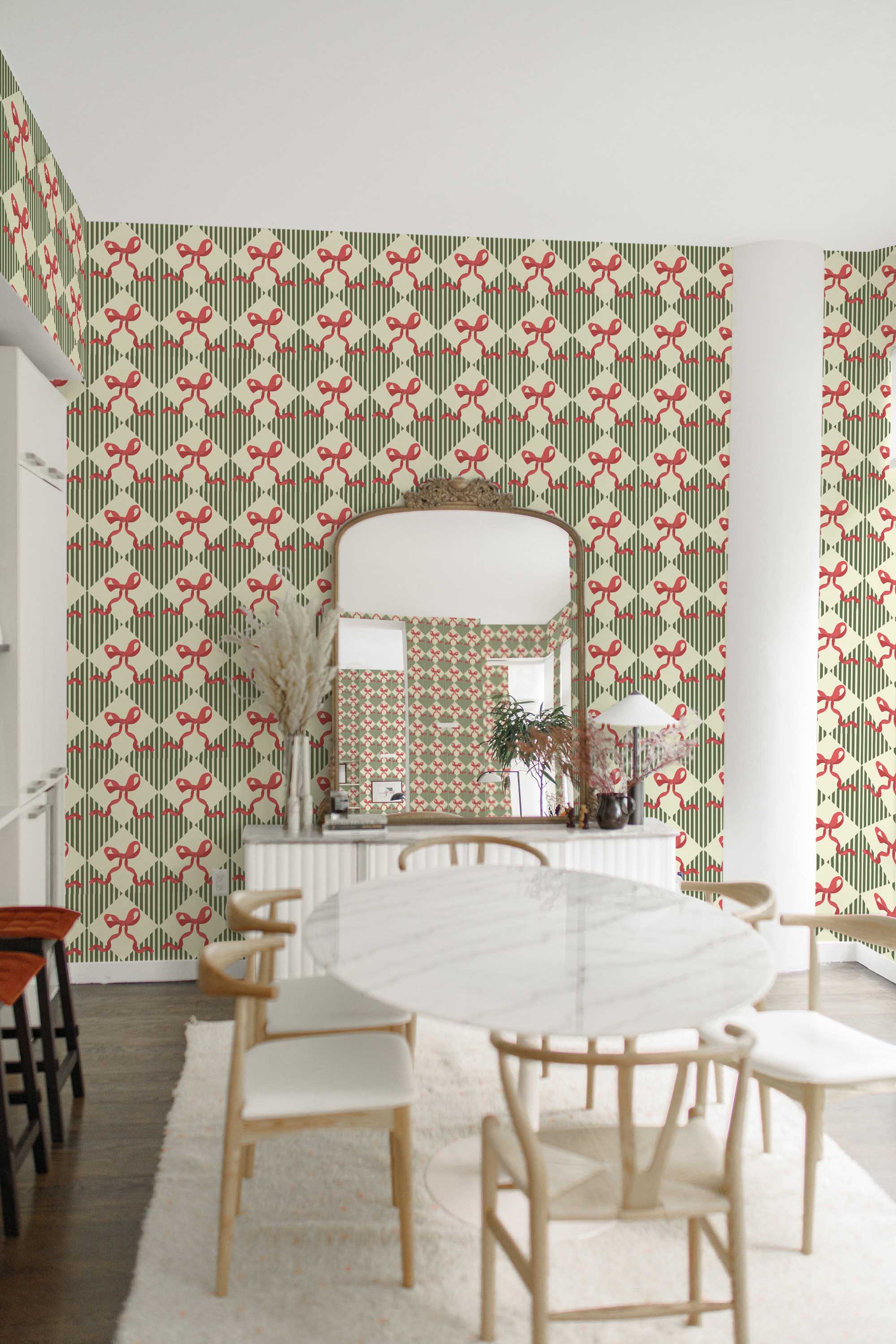 Fancy Walls peel and stick wallpaper featuring green and coral Christmas bow ribbon pattern.