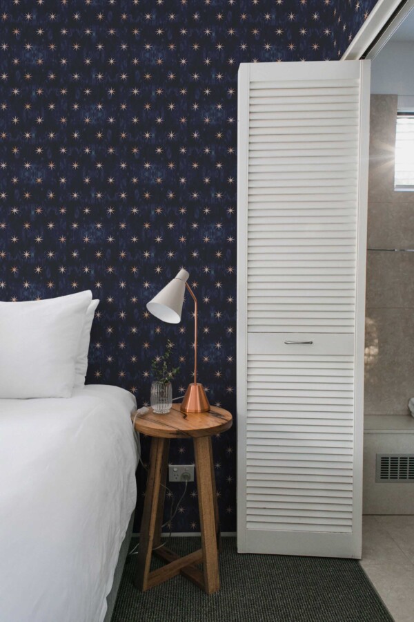 Fancy Walls traditional wallpaper styled with tie dye blue stars and gothic details.