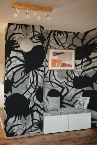 Fancy Walls Dark Spiders printed wall mural with detailed overlapping spider silhouettes wall mural printing for modern interiors