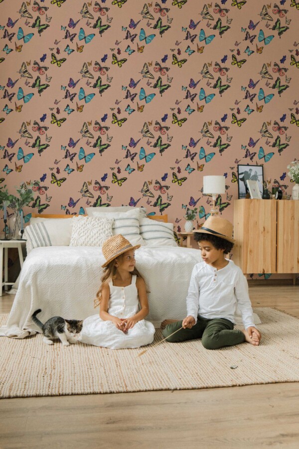 Fancy Walls self-adhesive wallpaper featuring colorful butterflies on dusty pink background.