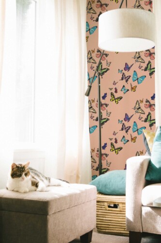 Fancy Walls peel and stick wallpaper with dusty rose butterfly pattern.