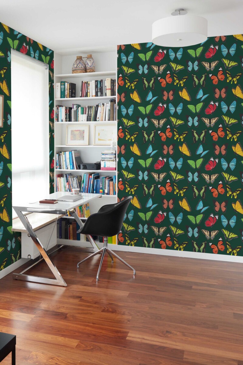 Fancy Walls peel and stick wallpaper with colorful butterflies on emerald green background.