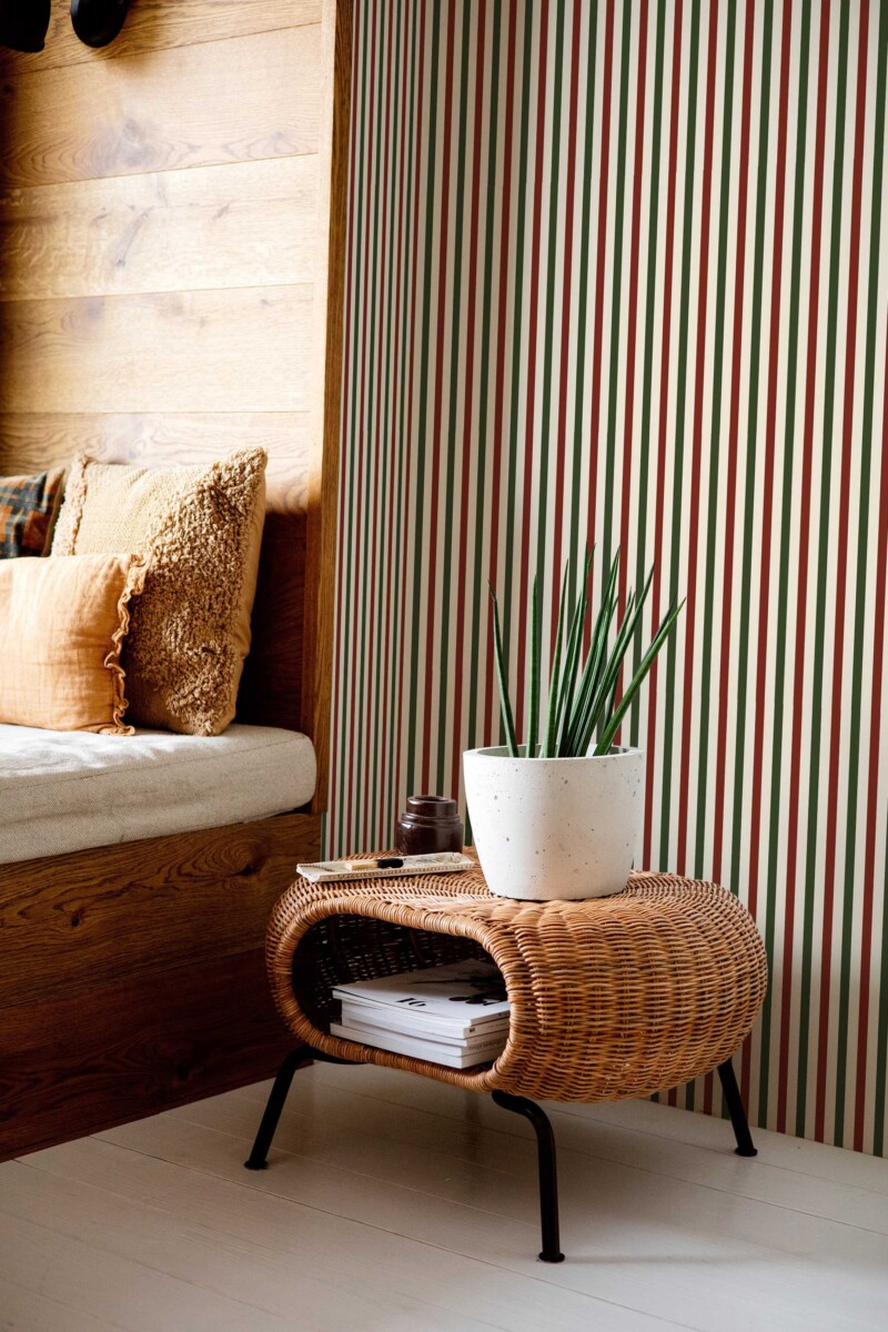 Fancy Walls peel and stick wallpaper featuring beige red and green stripes for a structured festive look.