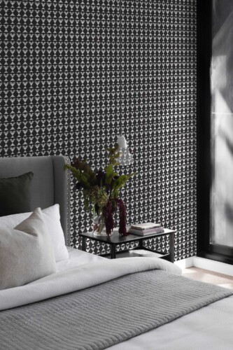Fancy Walls removable wallpaper with black and white geometric eye check pattern.