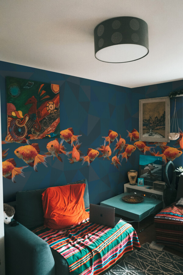 Polygonal Golden Fishes wall mural by Fancy Walls featuring golden fish swimming across geometric green background peel and stick wall mural