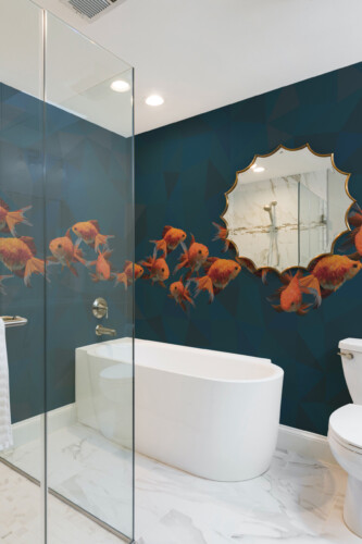 Polygonal Golden Fishes wall mural by Fancy Walls showing stylized goldfish design on geometric ocean background wall mural peel and stick finish