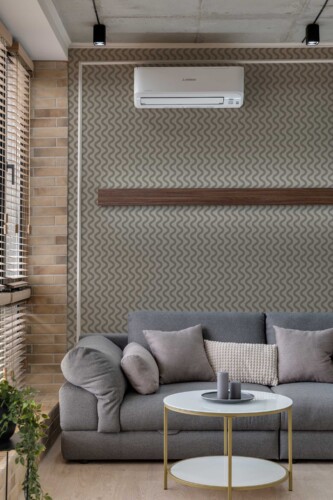 Fancy Walls peel and stick wallpaper with sandy waves in greige and brown tones.