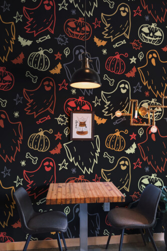 Spooky Chalkboard wall mural by Fancy Walls featuring colorful Halloween doodles with ghosts pumpkins and bats peel and stick wall mural