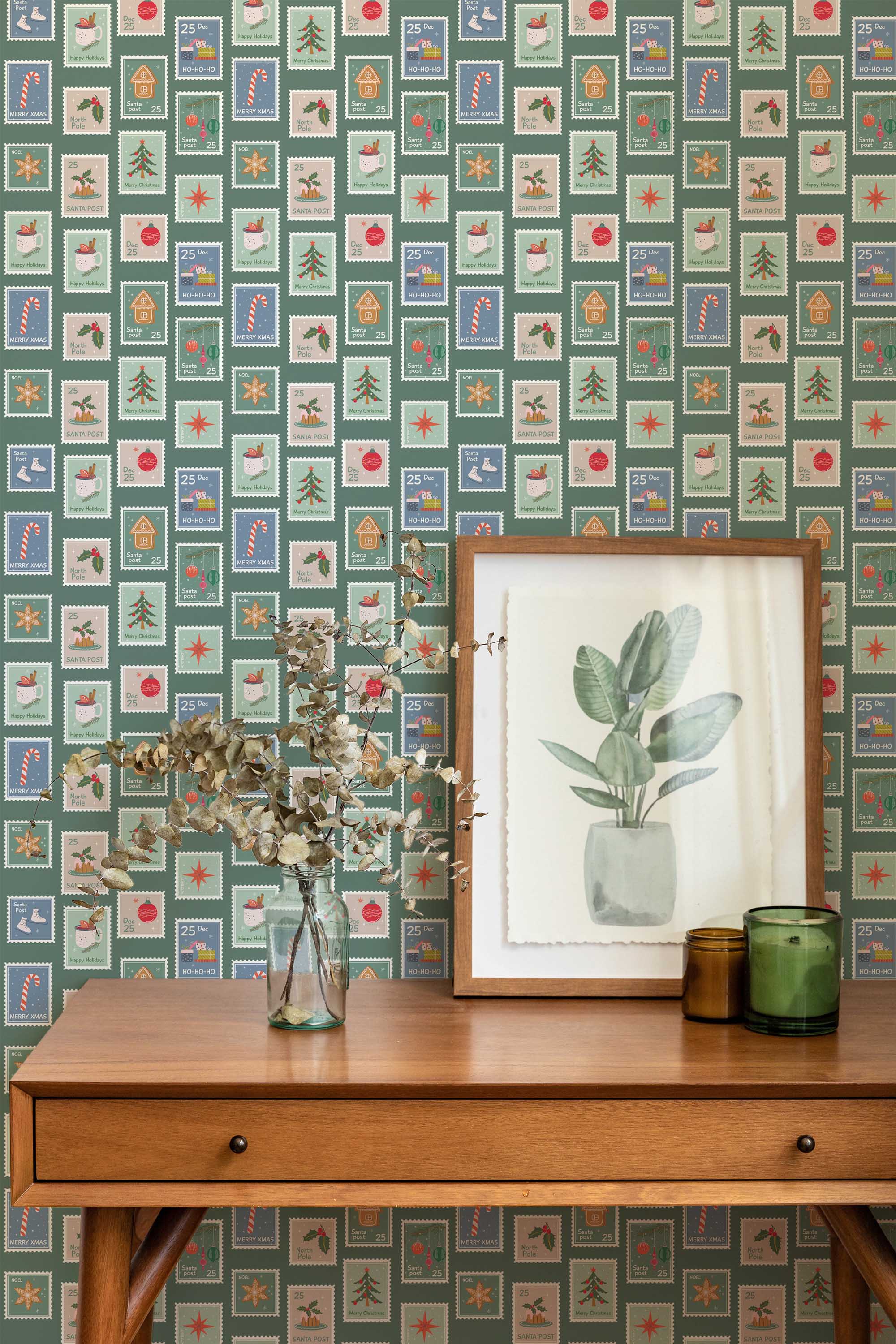 Fancy Walls peel and stick wallpaper featuring green postal squares with vintage winter icon designs.