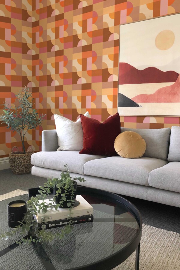 Fancy Walls peel and stick wallpaper with Bauhaus inspired terracotta and dusty pink geometric design.
