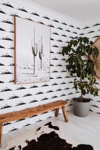 Fancy Walls peel and stick wallpaper featuring a black and white Los Angeles skyline pattern.
