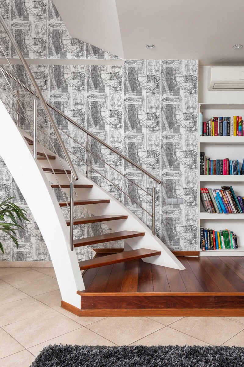 Fancy Walls peel and stick wallpaper featuring an intricate black and white New York map pattern.