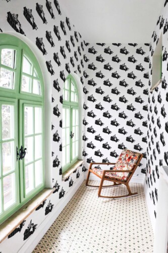 Fancy Walls removable wallpaper showcasing graphic black and white Canada map silhouettes.