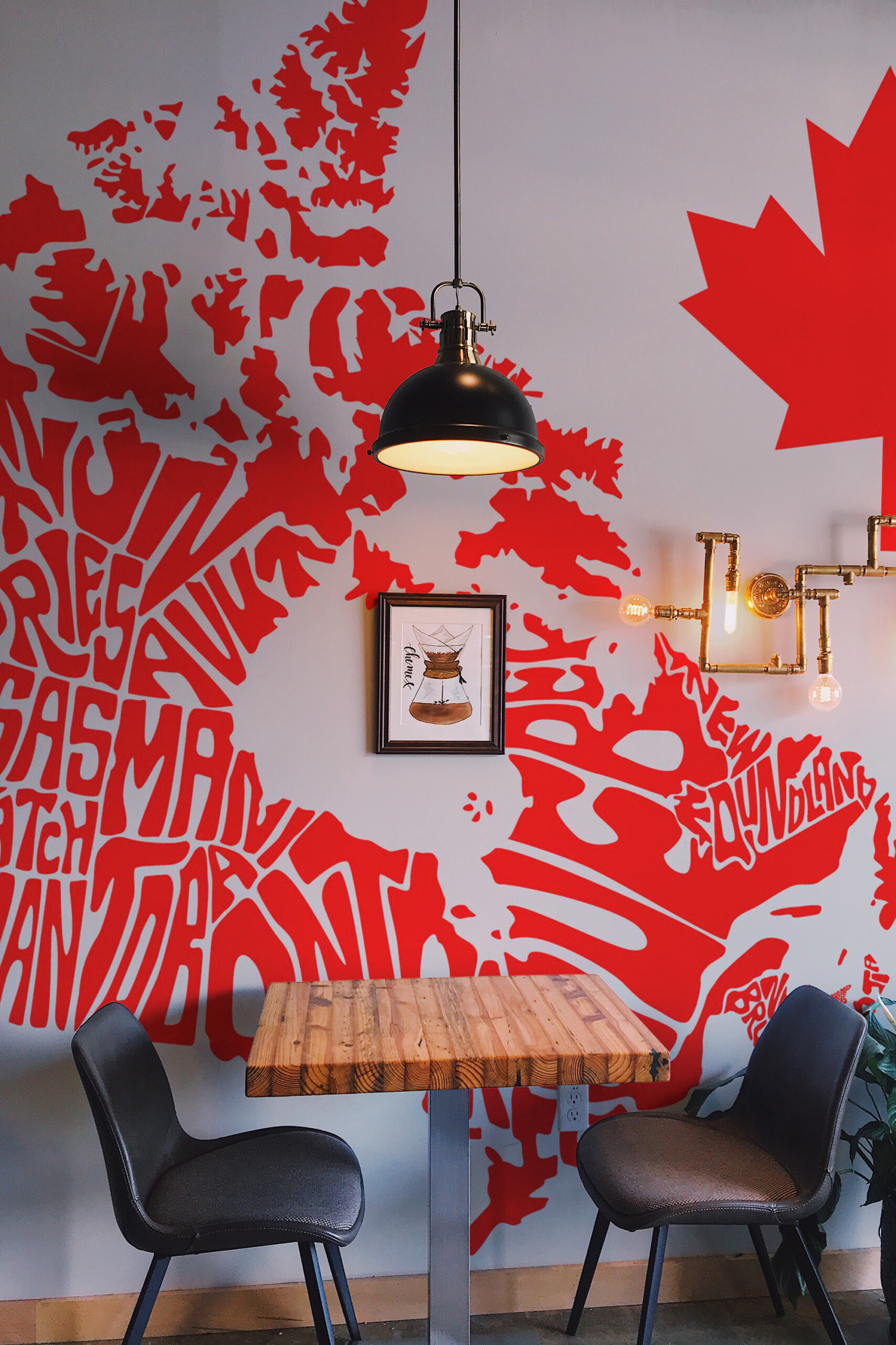 Fancy Walls Artistic Canada Map peel and stick wall mural with bold red typographic Canada outline