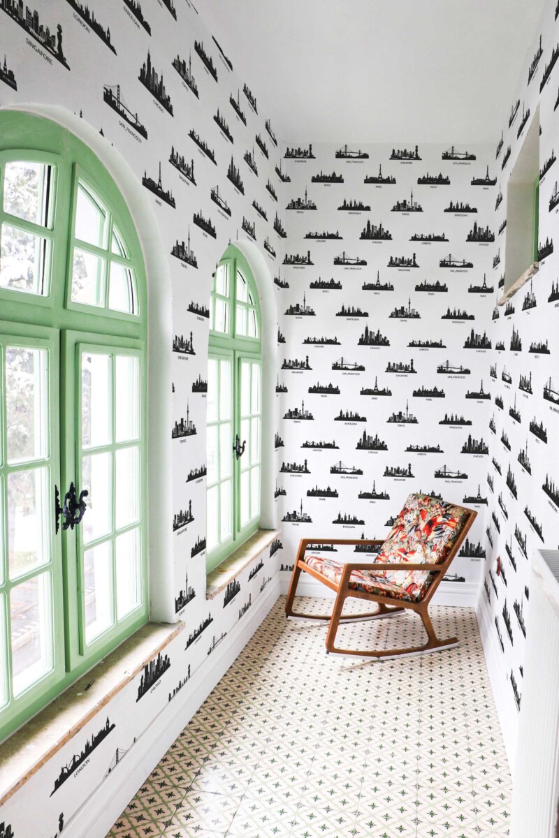 Fancy Walls traditional wallpaper with worldwide capital city skyline artwork.