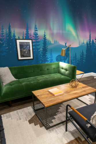 Fancy Walls Majestic Northern Lights Deer peel and stick wall mural with calming blue winter scenery.