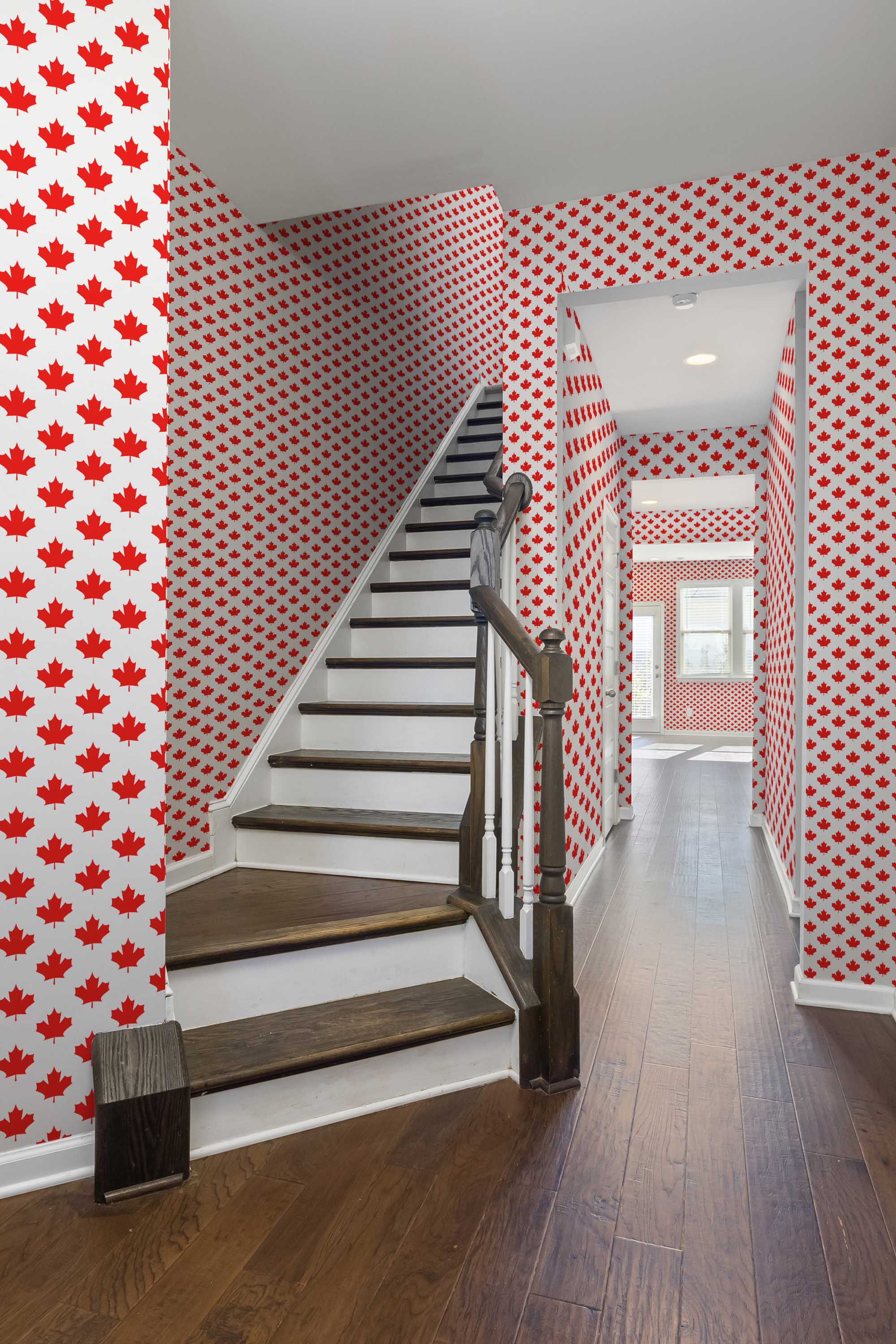 Fancy Walls traditional wallpaper with bright red maple leaf icons for a national mood.