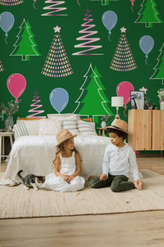 Fancy Walls Merry Pines peel and stick wall mural with bright green Christmas trees and balloons.