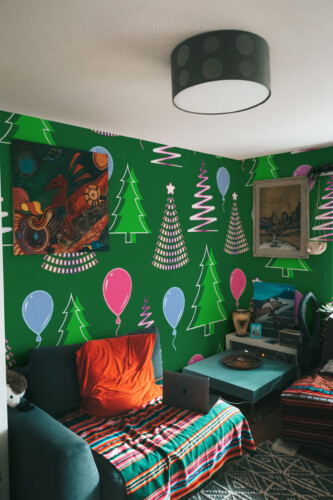 Fancy Walls Merry Pines commercial peel and stick wall mural for cheerful seasonal décor.