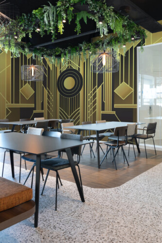 Fancy Walls Radiant Art Deco Geometry wall mural printing with metallic effect lines and bold shapes.