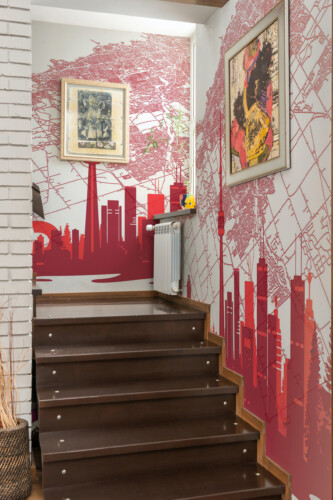 Fancy Walls Ottawa Map Skyline wall mural peel and stick featuring artistic red Ottawa skyline and detailed city map lines.