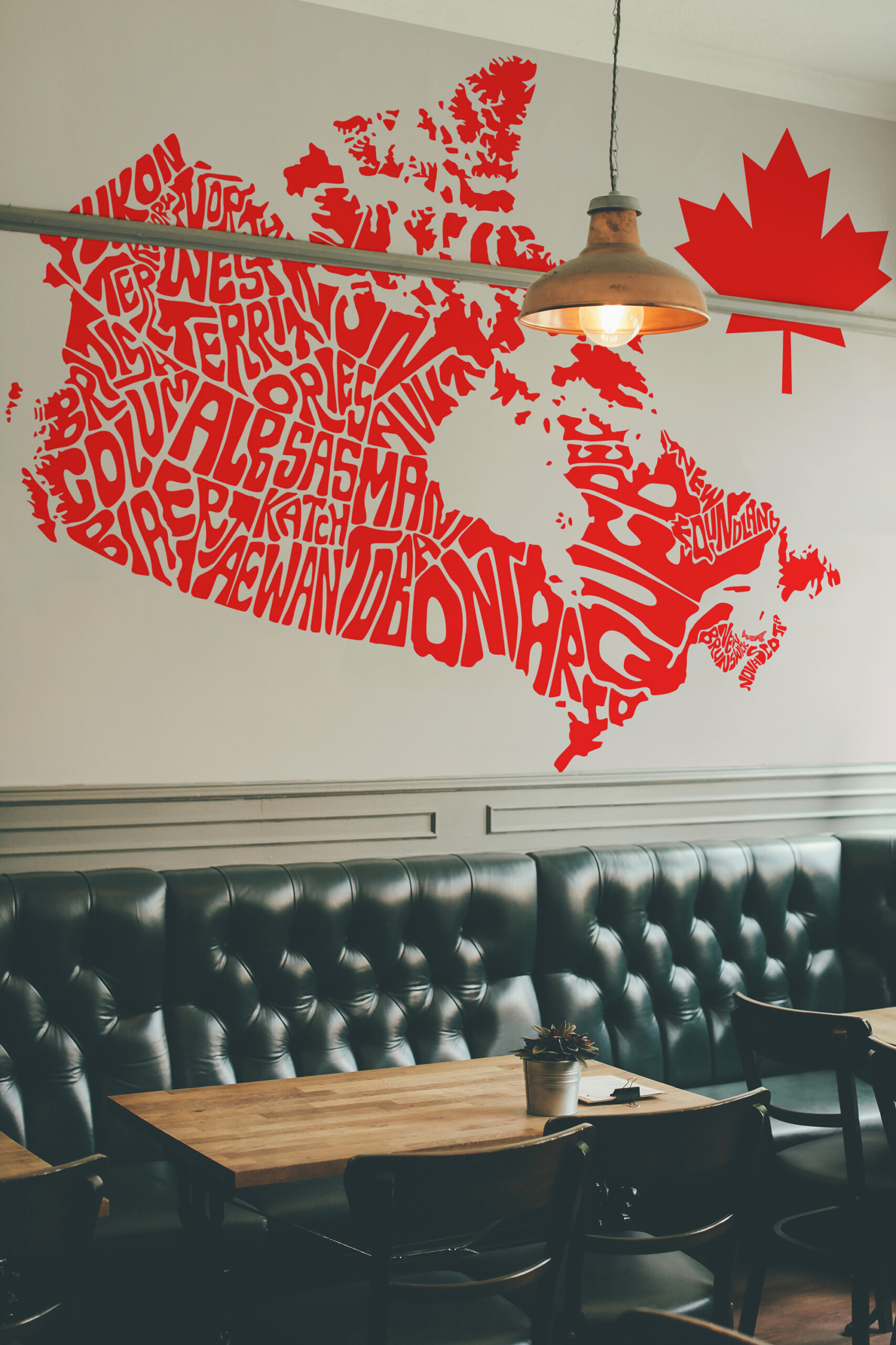 Fancy Walls Artistic Canada Map wall mural showing creative red typography map with maple leaf