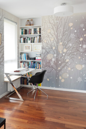 Fancy Walls Subtle Winter Forest wall mural printing with muted gray winter landscape.