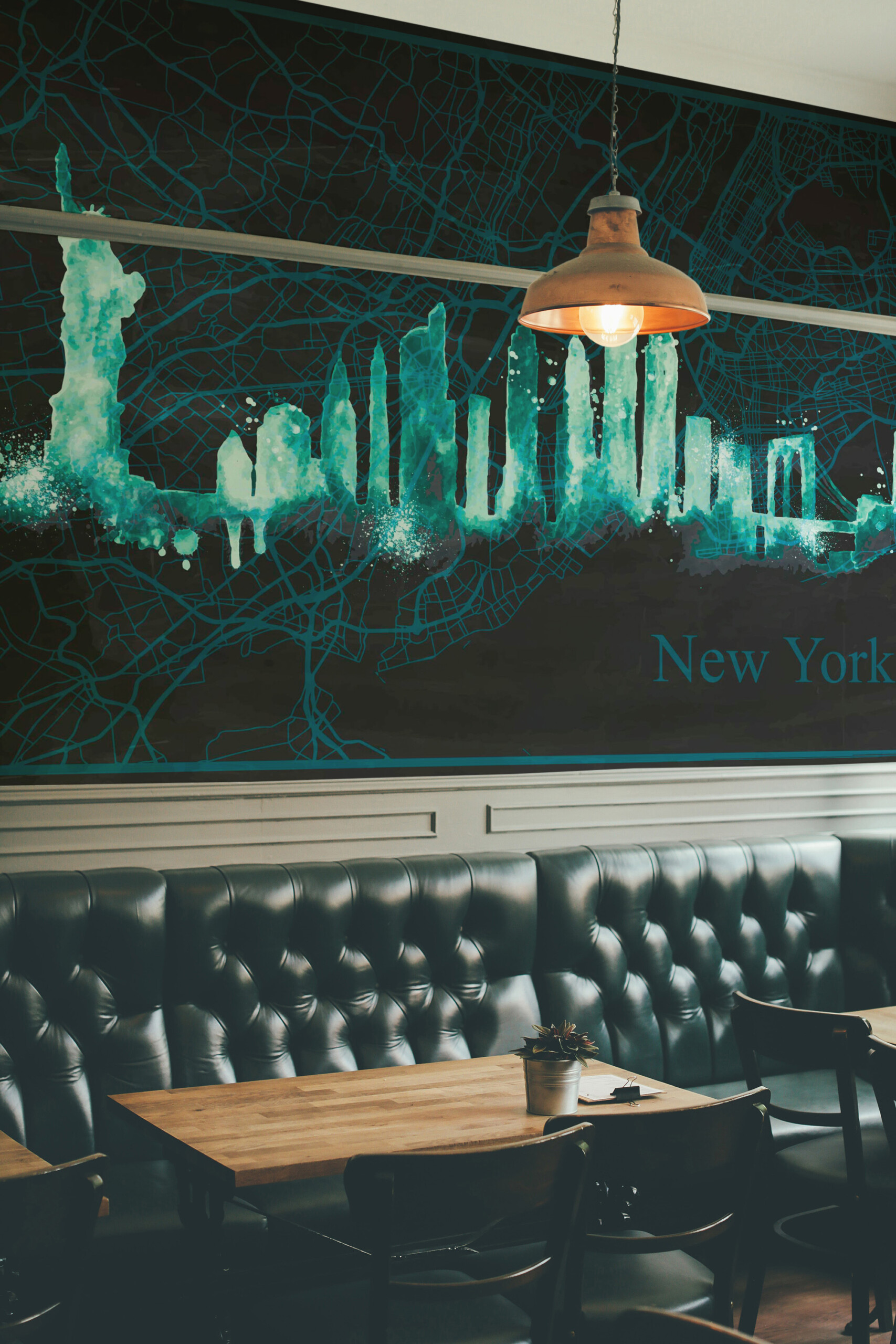 Fancy Walls Turquoise New York Map removable wall mural showing artistic turquoise skyscrapers and modern New York map.