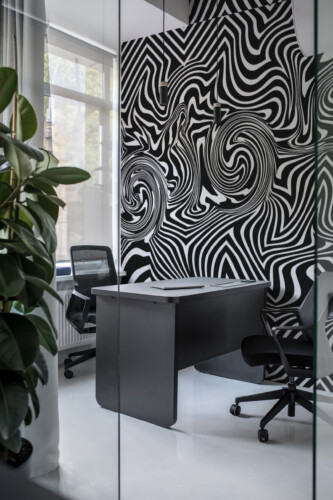 Abstract Illusion Flow peel and stick wall mural featuring hypnotic black-and-white swirls — a PVC-free and eco-friendly removable wallpaper mural.